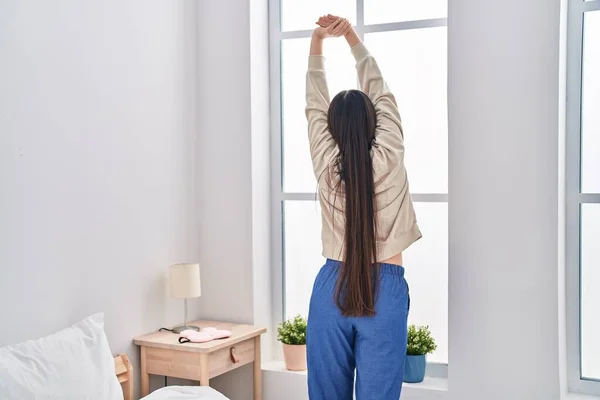 Chinese Woman Waking Stretching Arms Bedroom — Stock Fotó