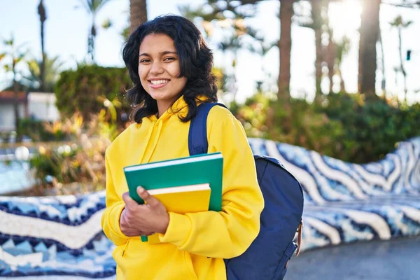 Young Latin Woman Student Smiling Confident Holding Books Park — ストック写真
