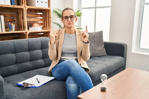 Young Woman Working Consultation Office Pointing Looking Sad Upset Indicating — Stock Photo, Image