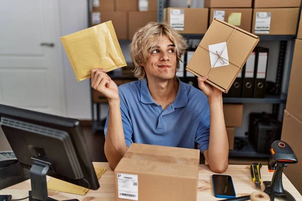Young Man Working Small Business Ecommerce Holding Packages Smiling Looking — Stock Photo, Image