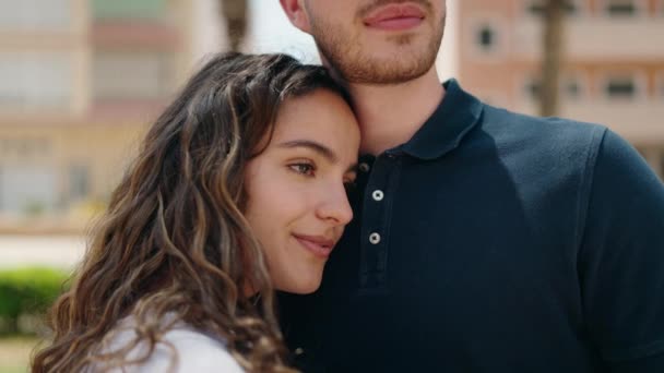 Young Hispanic Couple Smiling Confident Hugging Each Other Park — Stockvideo