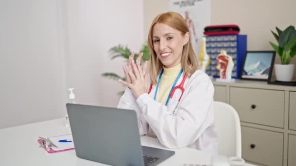 Young Blonde Woman Doctor Using Laptop Working Clinic — Stock Video