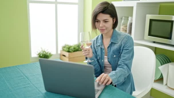 Young Caucasian Woman Using Laptop Drinking Wine Home — Stock Video