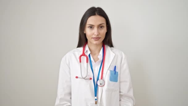 Young Beautiful Hispanic Woman Doctor Standing Clueless Isolated White Background — Stock Video