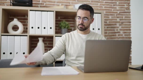 Young Hispanic Man Business Worker Using Laptop Reading Document Office — Αρχείο Βίντεο