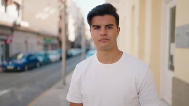 Young Hispanic Man Wearing Medical Mask Standing Street — Vídeos de Stock