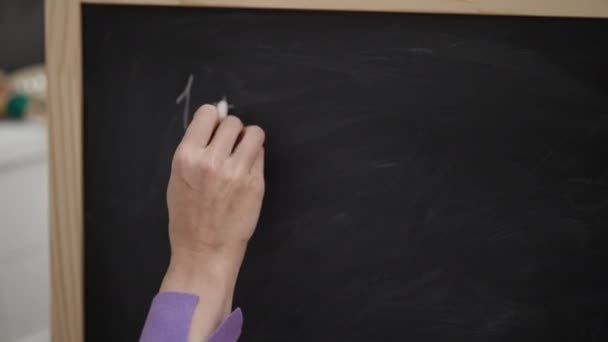 Young Blonde Woman Preschool Teacher Writing Maths Exercise Blackboard Kindergarten — Wideo stockowe