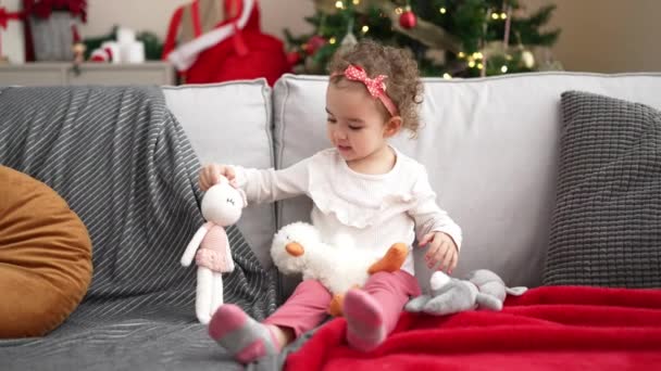 Adorable Caucasian Girl Playing Toys Sitting Sofa Christmas Tree Home — Wideo stockowe