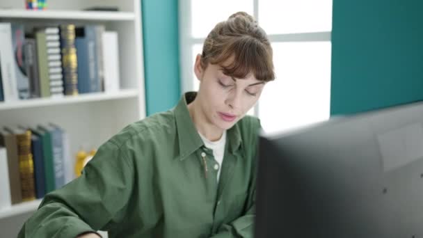 Young Caucasian Woman Using Computer Stressed Tired Library University — Vídeos de Stock