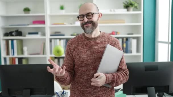 Young Bald Man Teacher Holding Laptop Apple University Classroom — Stock Video