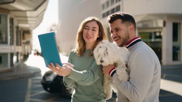 Young Couple Holding Dog Having Video Call Street — Stockvideo