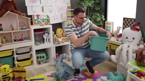 Young Caucasian Man Working Teacher Tidying Kindergarten — Wideo stockowe