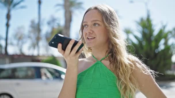 Young Blonde Woman Sending Voice Message Smartphone Street — Vídeo de Stock