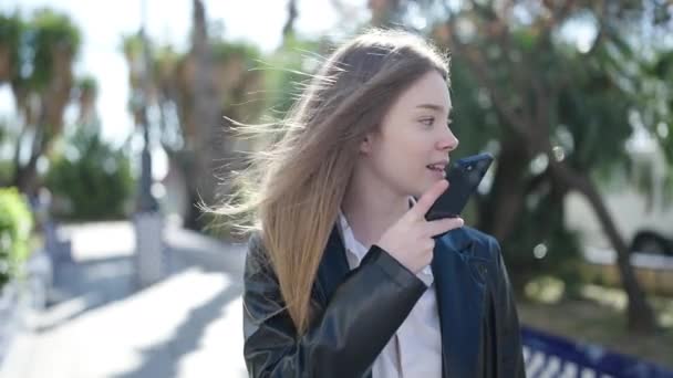 Young Blonde Woman Sending Voice Message Smartphone Park — Video