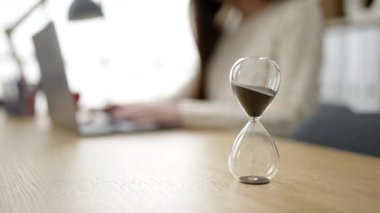 Young beautiful hispanic woman business worker using laptop working at office