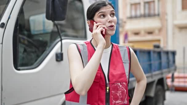 Young Beautiful Hispanic Woman Builder Talking Smartphone Standing Truck Street — Stock Video