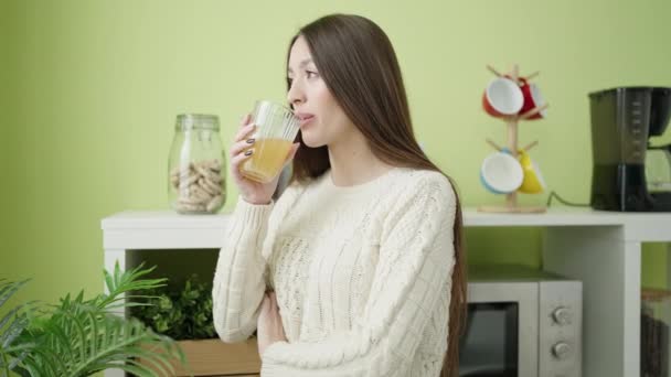 Young Beautiful Hispanic Woman Drinking Glass Orange Juice Standing Home — Stock Video