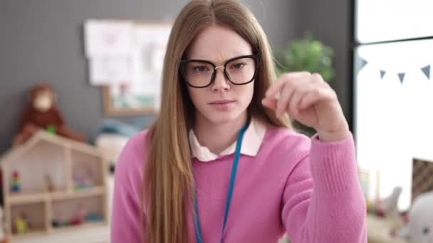 Young Blonde Woman Working Teacher Standing Arms Crossed Gesture Kindergarten — Stockvideo
