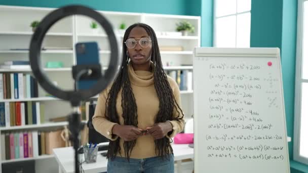 African Woman Recording Teaching Maths Magnetic Board Library University — Vídeos de Stock