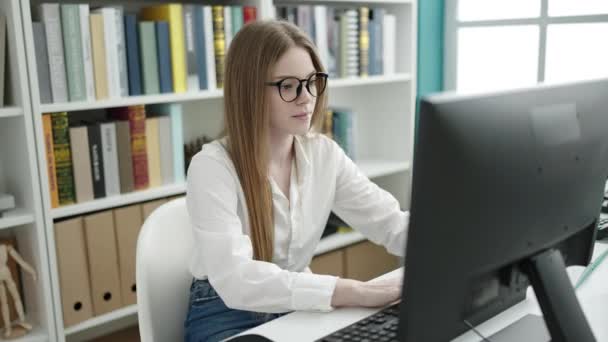 Young Blonde Woman Student Using Computer Studying University Classroom — Vídeos de Stock