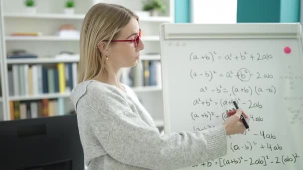 Young Blonde Woman Teaching Maths Magnetic Board Library University — Vídeos de Stock