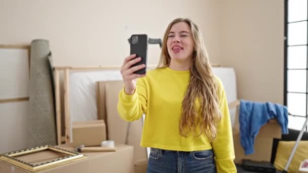 Young Blonde Woman Having Video Call Holding Key New Home — Stockvideo