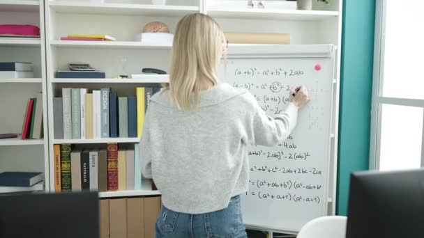 Young Blonde Woman Standing Magnetic Board Library University — Stockvideo