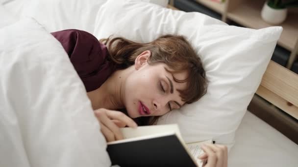 Young Caucasian Woman Reading Book Bed Bedroom — Vídeo de stock