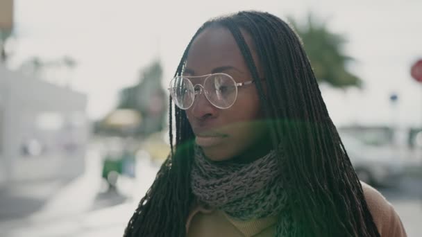 African Woman Standing Serious Expression Wearing Glasses Street — Stockvideo