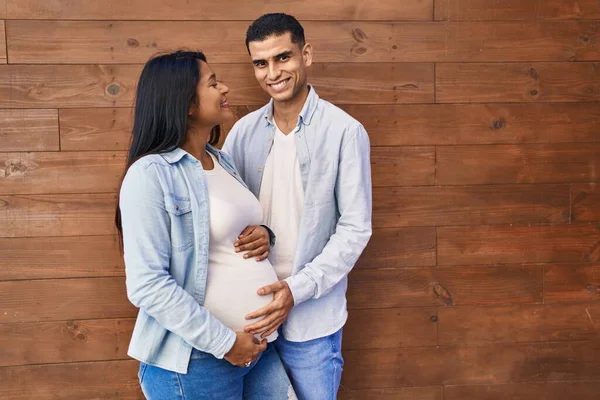 Young Latin Couple Expecting Baby Touching Belly Street — Foto Stock