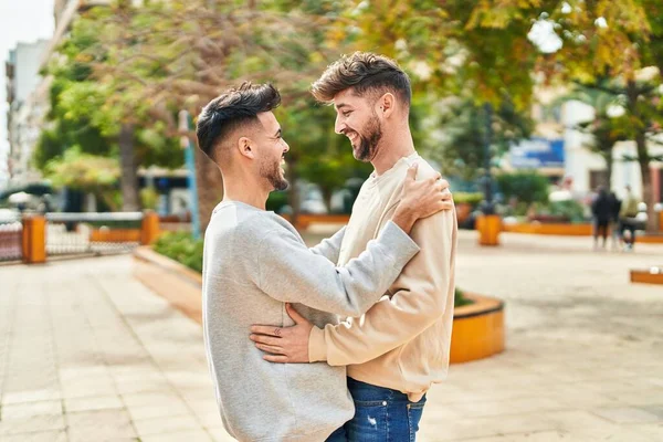 Young Couple Smiling Confident Hugging Each Other Park — Stockfoto
