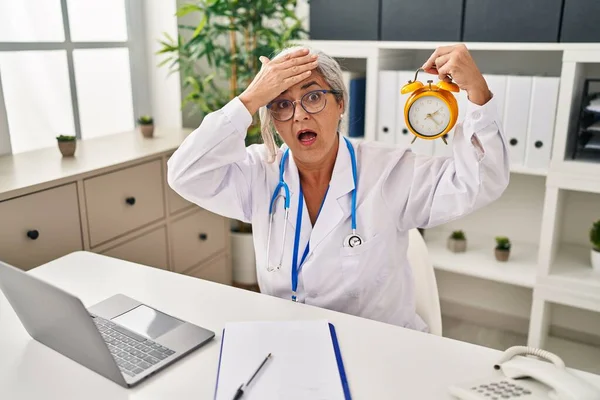 Middle Age Woman Grey Hair Wearing Doctor Uniform Holding Alarm — Stock Photo, Image