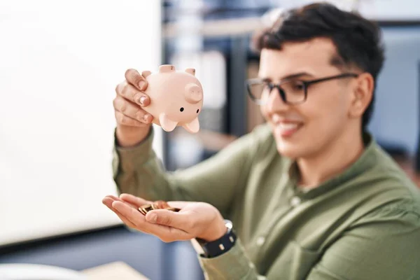 Young Non Binary Man Business Worker Emptying Piggy Bank Office — Stockfoto