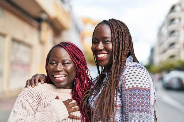 African American Women Friends Smiling Confident Hugging Each Other Street — Zdjęcie stockowe
