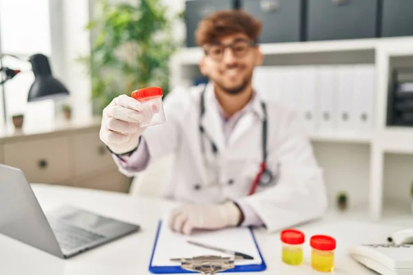 Young Arab Man Wearing Doctor Uniform Holding Test Tube Clinic — Stock Photo, Image