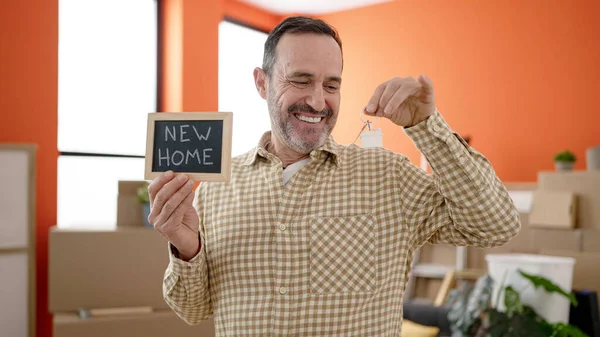 Middle Age Man Smiling Confident Holding Key Blackboard New Home —  Fotos de Stock