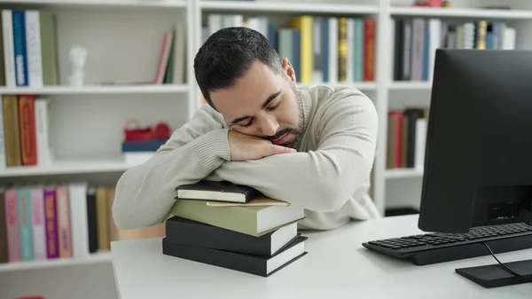 Young Hispanic Man Student Sleeping Head Books Library University — Fotografia de Stock