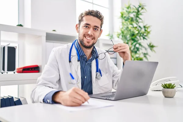 Young Man Doctor Using Laptop Writing Medical Report Clinic — 스톡 사진