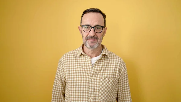 Middle Age Man Wearing Glasses Relaxed Expression Isolated Yellow Background — Fotografia de Stock