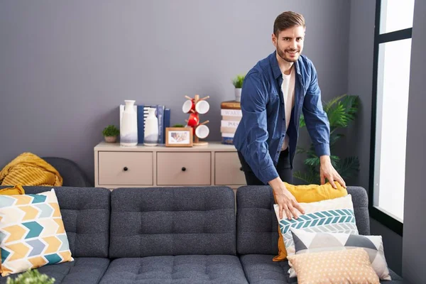 Young Caucasian Man Smiling Confident Organize Sofa Home — Stock Photo, Image