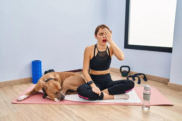 Young Beautiful Woman Sitting Yoga Mat Yawning Tired Covering Half — Stock Photo, Image