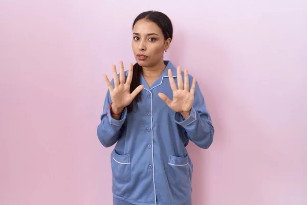 Young Arab Woman Wearing Blue Pajama Moving Away Hands Palms — Stock Photo, Image
