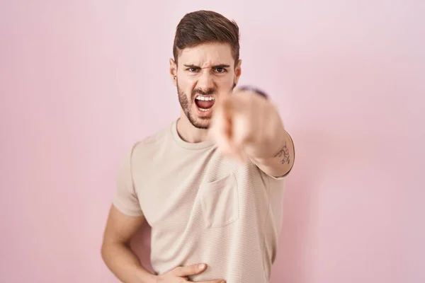 Hispanic Man Beard Standing Pink Background Pointing Displeased Frustrated Camera — Foto Stock
