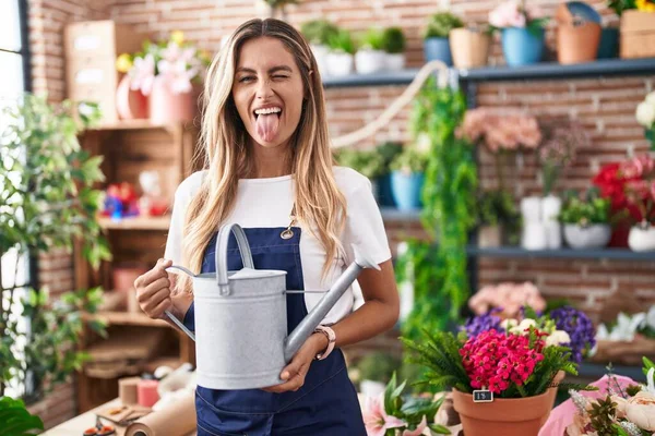 Young Blonde Woman Working Florist Shop Sticking Tongue Out Happy — 图库照片
