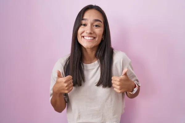 Young Hispanic Woman Standing Pink Background Success Sign Doing Positive — 图库照片