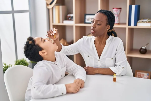 African American Mother Son Having Nose Treatment Home — Stockfoto