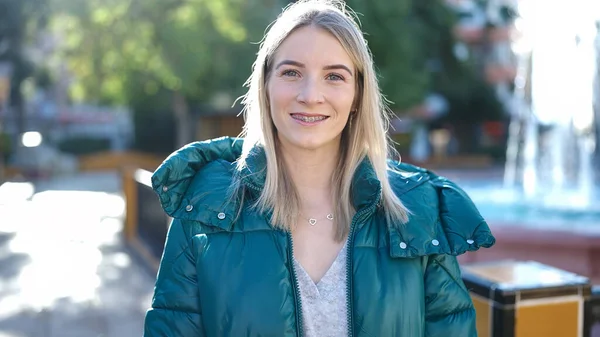 Young Blonde Woman Smiling Confident Showing Braces Park — Stok fotoğraf