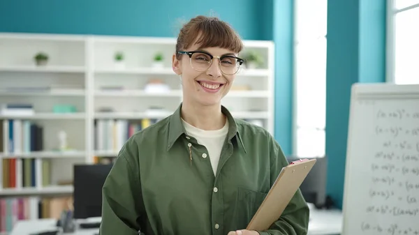 Young Caucasian Woman Smiling Wearing Glasses Holding Clipboard Library University — Foto de Stock