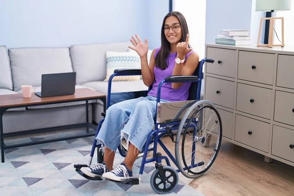 Young Hispanic Woman Sitting Wheelchair Home Showing Pointing Fingers Number — Stock Photo, Image