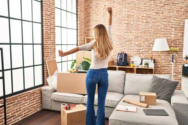 Young Blonde Woman Back View Dancing New Home — Stock Photo, Image
